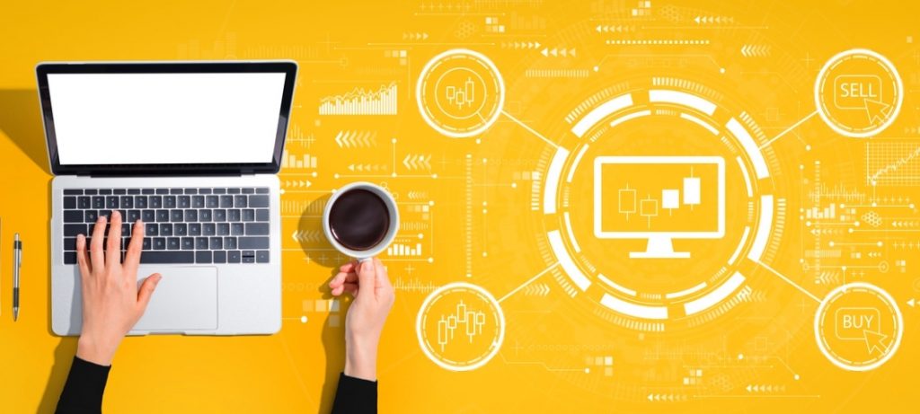 Person working on a laptop, on a yellow background with buy, sell drawing and trading candles.