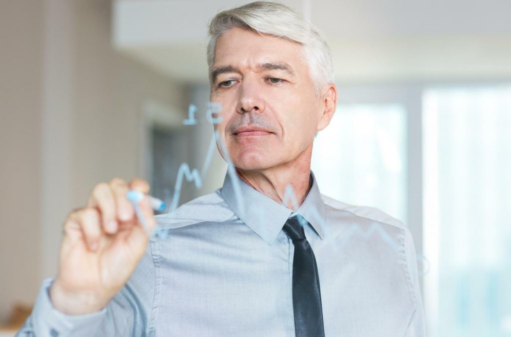 Standard Futures vs. Perpetual Futures are represented by a trader painting a price chart