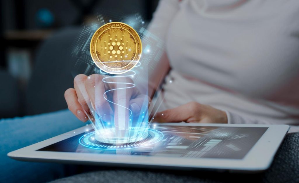 Best Spot trading strategy is represented with a Cardano coin floating above a tablet